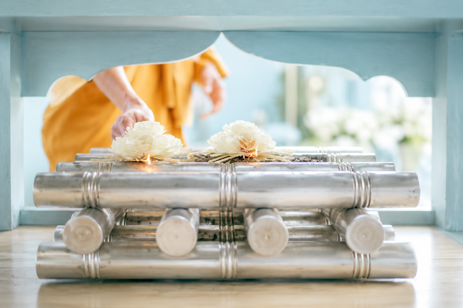 Cremation setup with white flowers as part of a funeral arrangement